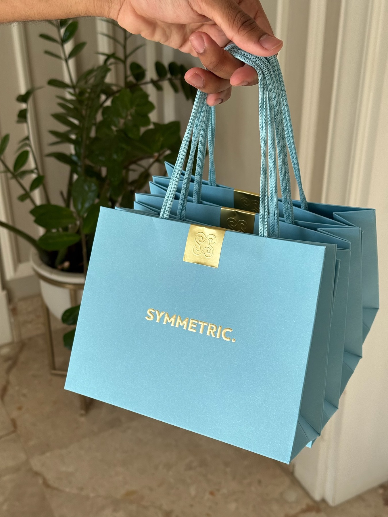 Symmetric gifting prepared for a private event